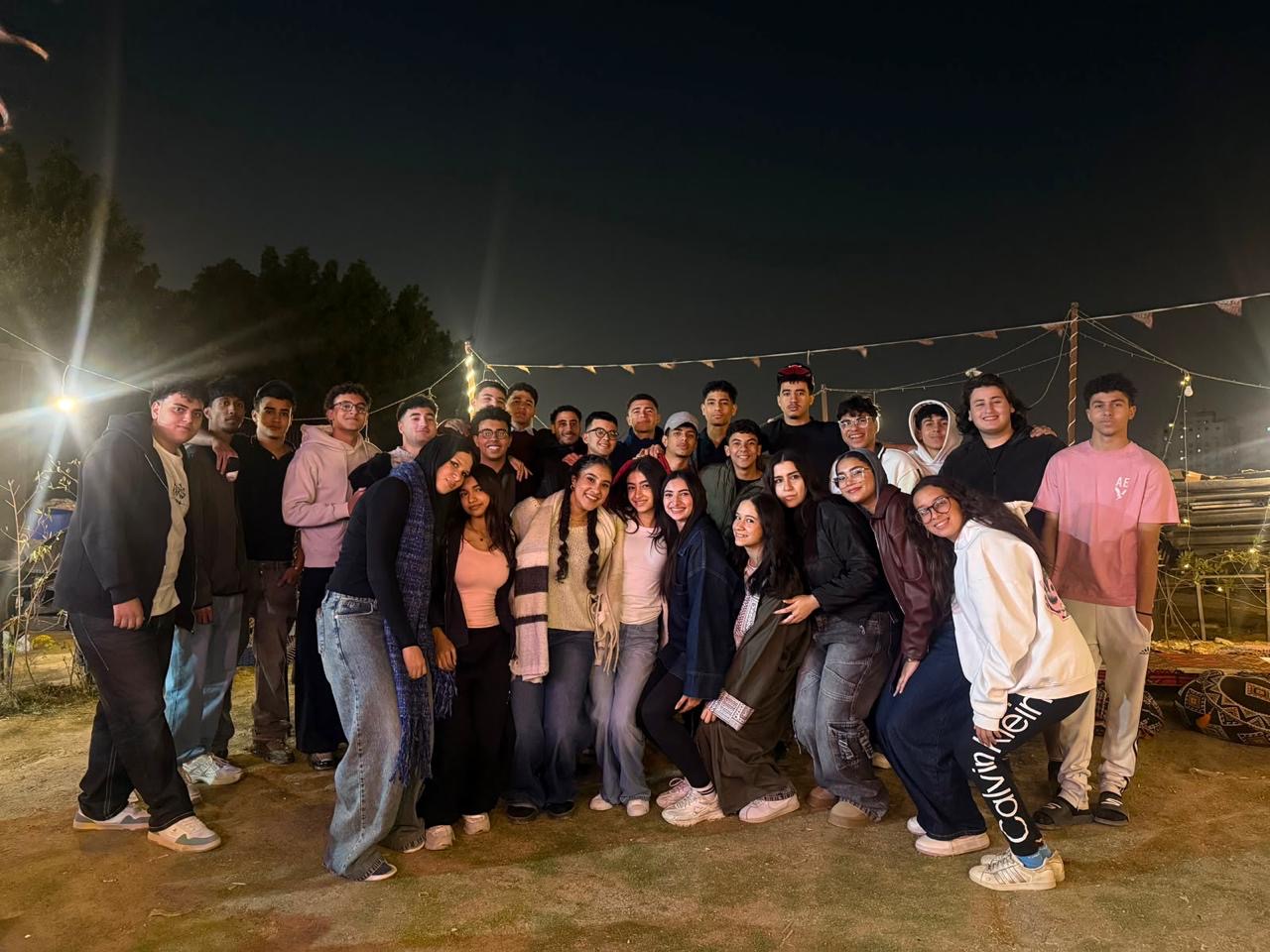 Friends together on a warm campus evening