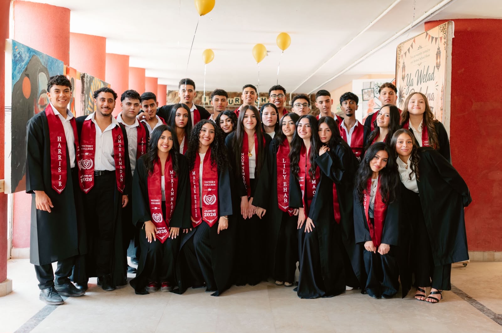 Graduates gathered in the school corridor